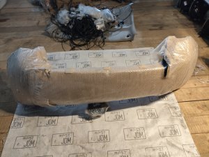 Бампер задний NISSAN NOTE